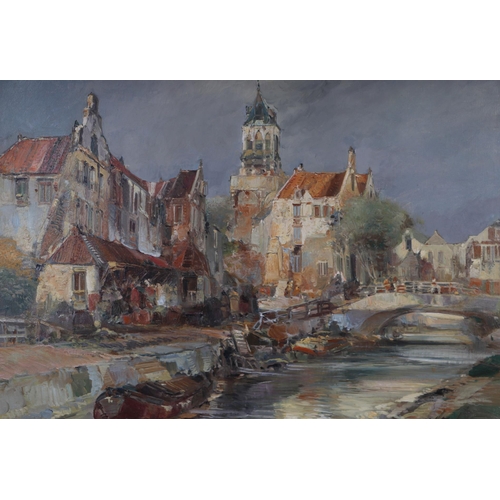 293 - Continental school - Town Scene with a Canal and Barges in the Foreground - indistinctly signed lowe... 