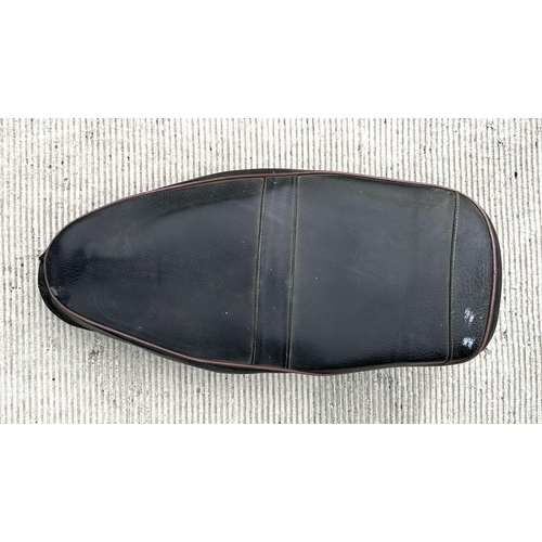 3 - A BSA ZB Gold Star saddle; together with a pair of black leather motorcycle boots.