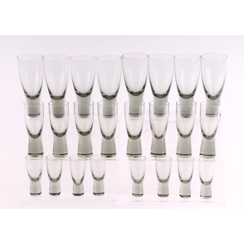 338 - A suite of Holmegaard glass to include shot glasses and other glasses.