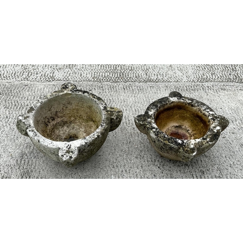 35 - A marble mortar, 30cms diameter; together with a reconstituted stone mortar, 33cms wide (2).