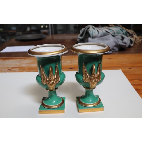 351 - A pair of 19th century continental vases with gilt swan form handles, 25cms high (2).