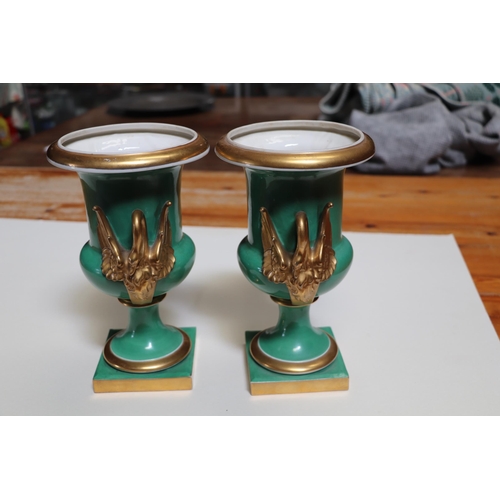 351 - A pair of 19th century continental vases with gilt swan form handles, 25cms high (2).