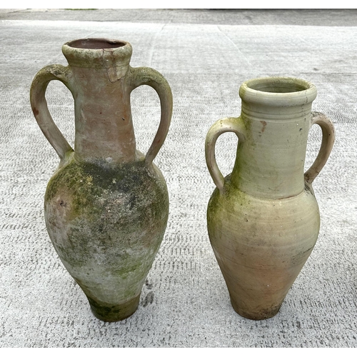 37 - A group of two-handled amphora terracotta olive jars, the largest 51cms high (5).