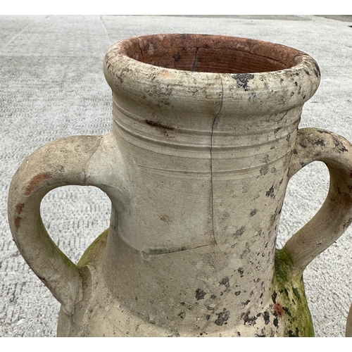 37 - A group of two-handled amphora terracotta olive jars, the largest 51cms high (5).