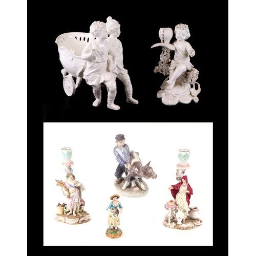 383 - A pair of Augustus Rex porcelain figural candlesticks, 21cms high; together with a 19th century Derb... 