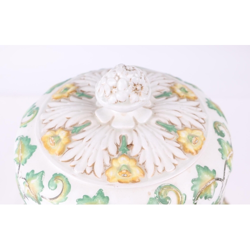 386 - A Victorian pottery Stilton dome decorated in relief with scrolling foliage, 32cms high.