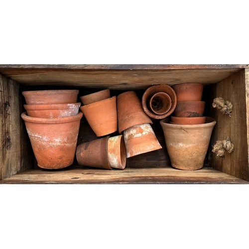 39 - A quantity of terracotta flowerpots.