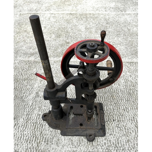 40 - A cast iron book press; together with a Union pillar drill (2).