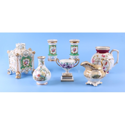 401 - Assorted continental ceramics to include a porcelain milk jug, 11cm high; a pair of posy vases decor... 