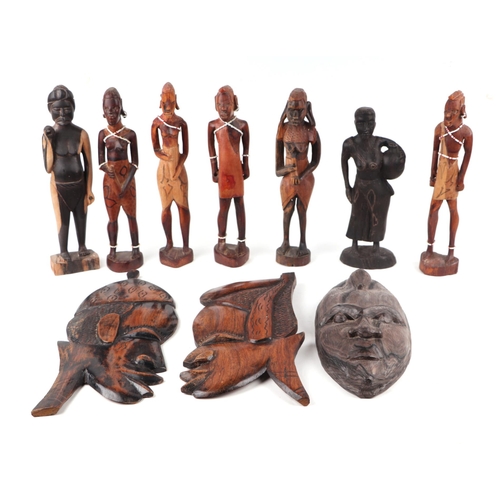 417 - A large quantity of Asian and ethnographic wooden carvings depicting animals, figure and panels.