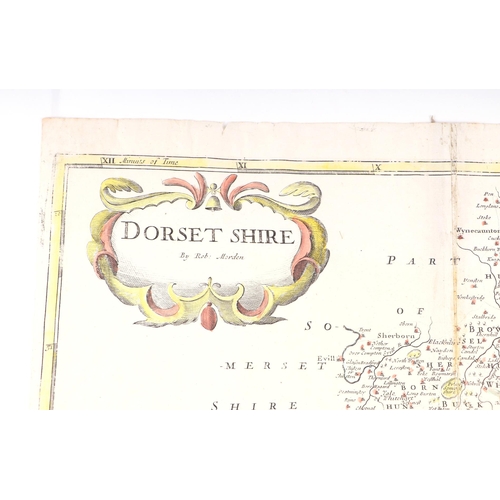 44 - John Speed - a hand coloured map of Dorsetshyre with armorials and vignette of Dorchester, 57 by 43c... 