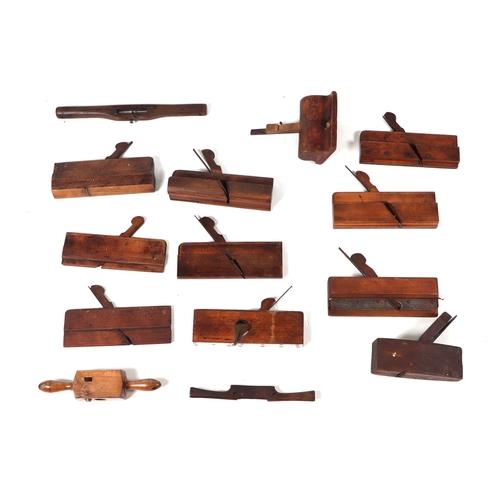 452 - A quantity of woodworking tools to include moulding planes and routers.