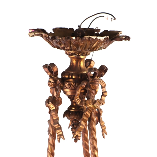 535 - A late 19th century Regency style gilt bronze ceiling light with ribbon tie decoration, 70cms high.