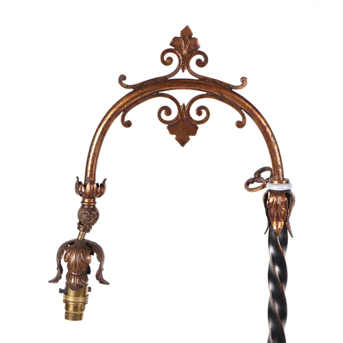 550 - A late 19th century wrought iron reading lamp, 124cm high.