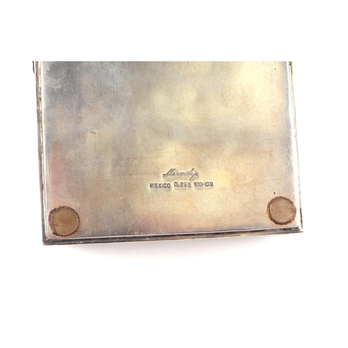 589 - A Mexican 925 silver table top cigarette box, 17cms wide.