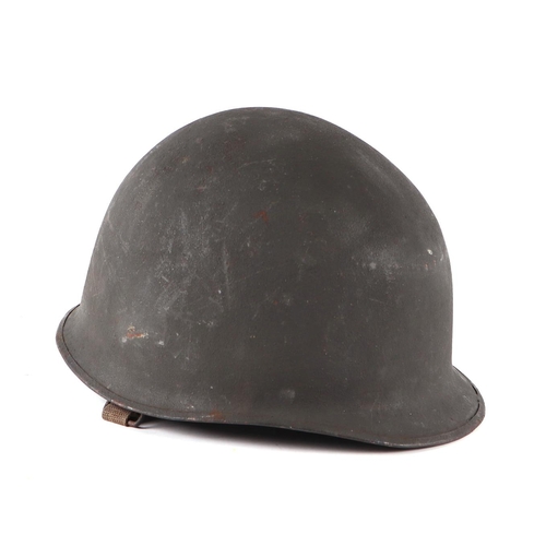 77 - A WWII American GI helmet.