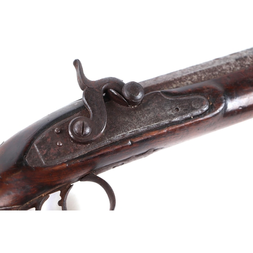 79 - A 19th century percussion pistol with walnut stock, signed G Smith.