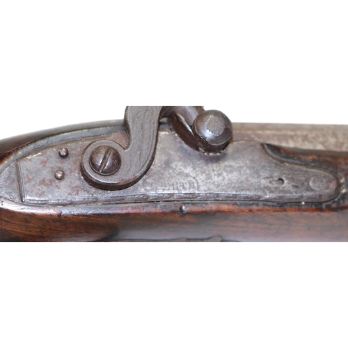 79 - A 19th century percussion pistol with walnut stock, signed G Smith.