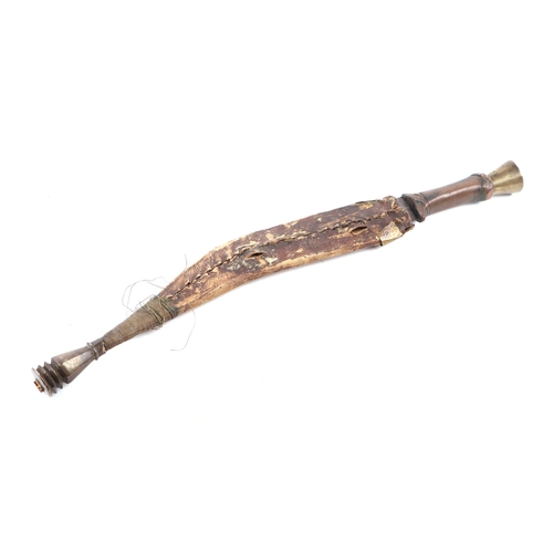 80 - A North African dagger with copper wire bound grip and leather scabbard, 49cm long.