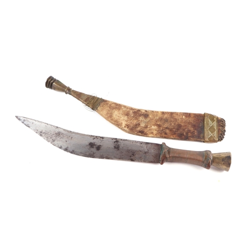 80 - A North African dagger with copper wire bound grip and leather scabbard, 49cm long.