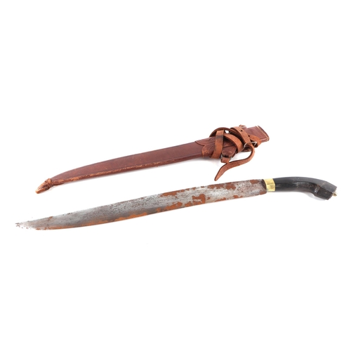 83 - A South American machete with hardwood handle and leather scabbard, 64cm long.