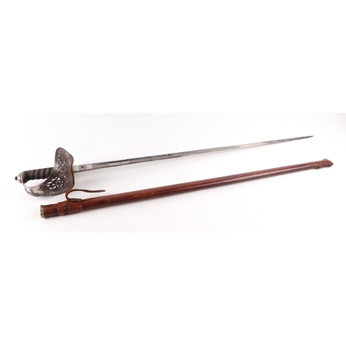 87 - An 1897 Pattern George V dress sword in leather scabbard, 101cm long.