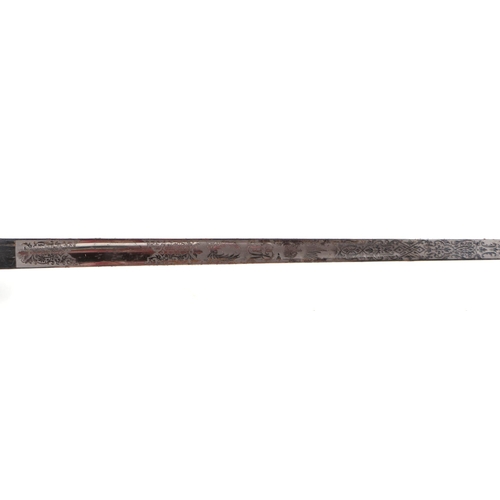 87 - An 1897 Pattern George V dress sword in leather scabbard, 101cm long.