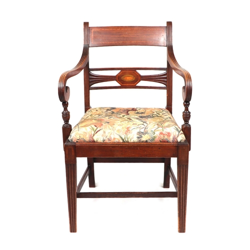 957 - An inlaid mahogany Regency desk chair with square tapering reeded legs; together with another simila... 