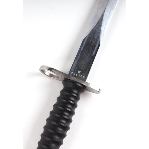 96 - A Swiss M1957 Schmidt Rubin bayonet for the STGW 57, in its scabbard with leather frog. Makers mark ... 