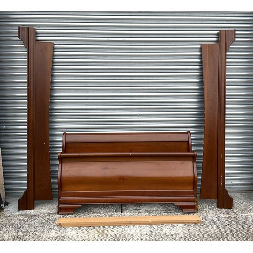 961 - A French mahogany sleigh bed, 148cm wide.