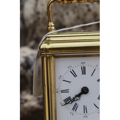 578 - A carriage clock, the white enamel dial with Roman and Arabic numerals, with blued steel hands, fitt... 