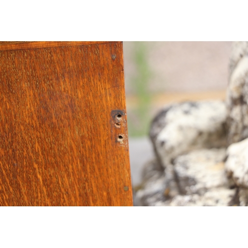 451 - A late Victorian / early Edwardian oak table to safe box, having twin doors opening to reveal three ... 