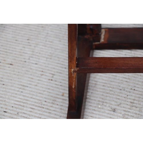 957 - An inlaid mahogany Regency desk chair with square tapering reeded legs; together with another simila... 