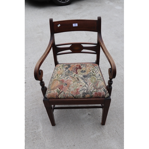 957 - An inlaid mahogany Regency desk chair with square tapering reeded legs; together with another simila... 