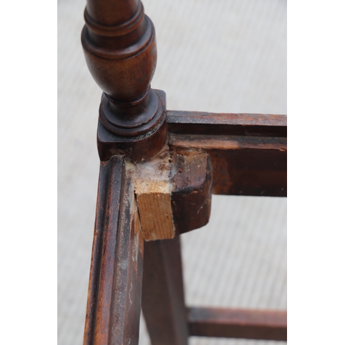 957 - An inlaid mahogany Regency desk chair with square tapering reeded legs; together with another simila... 