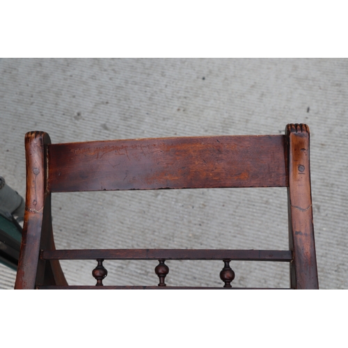 957 - An inlaid mahogany Regency desk chair with square tapering reeded legs; together with another simila... 