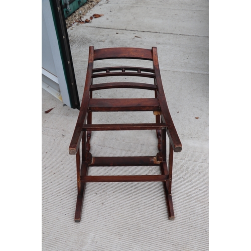 957 - An inlaid mahogany Regency desk chair with square tapering reeded legs; together with another simila... 