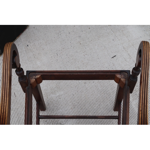 957 - An inlaid mahogany Regency desk chair with square tapering reeded legs; together with another simila... 