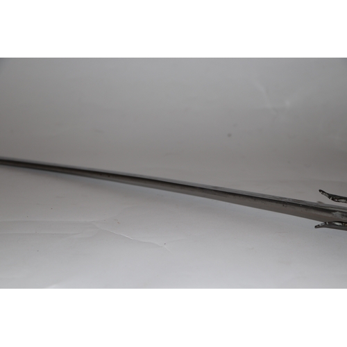 135 - An Indian Tulwar sword with white metal inlaid handle, 87cm long.