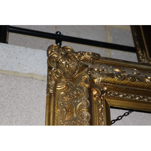 229 - A large 19th century gilt wood and gesso picture frame, overall 83cm by 96cm (to hold painting 58cm ... 