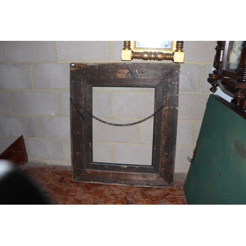 229 - A large 19th century gilt wood and gesso picture frame, overall 83cm by 96cm (to hold painting 58cm ... 