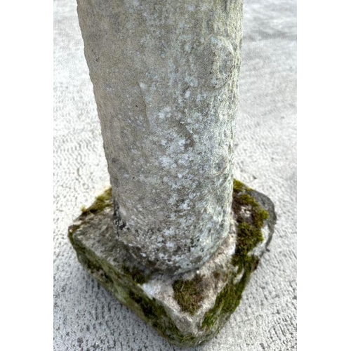 13 - A well weathered stone bird bath with circular bath, on a column with square base, 38cms diameter.