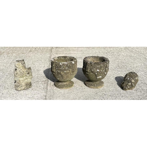 15 - A pair of reconstituted stone planters, 25cms high; together with two concrete garden animals (4).