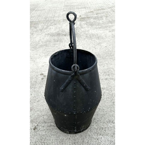 17 - A large riveted well bucket, 65cms high.