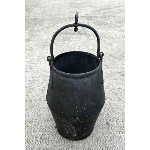 17 - A large riveted well bucket, 65cms high.