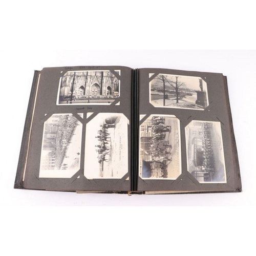 20 - An early 20th century photo album containing World Tour and Military photos; together with a postcar... 