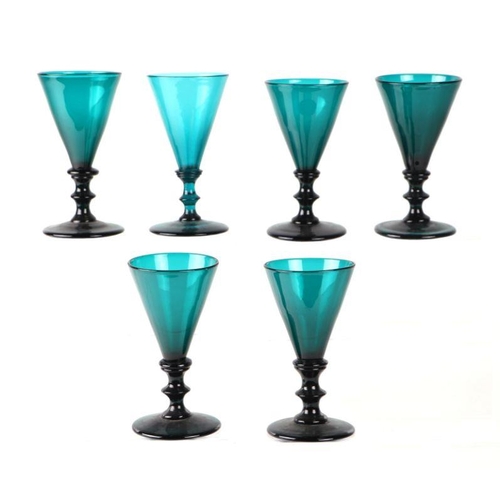 262 - A harlequin set of six Bristol green wine glasses with knopped stems and snapped of pontil marks.