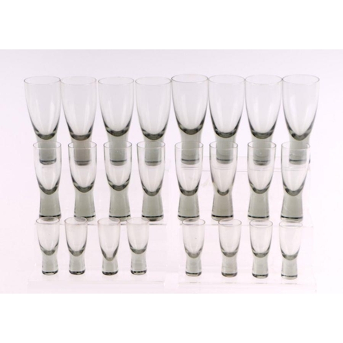 263 - A suite of Holmegaard glass to include shot glasses and other glasses.