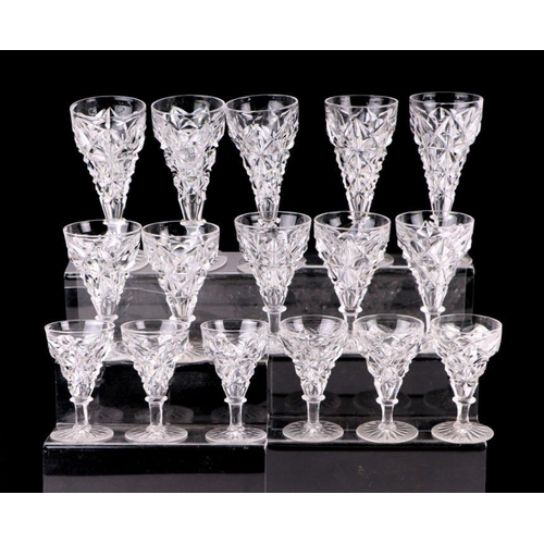 264 - A set of six cut glass sherry glasses and other similar cut glass and a set of eight martini glasses... 