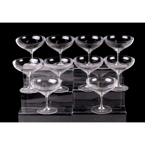 264 - A set of six cut glass sherry glasses and other similar cut glass and a set of eight martini glasses... 